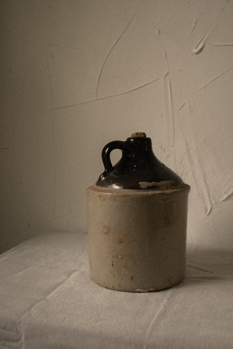 Antique stoneware whiskey jug vessel