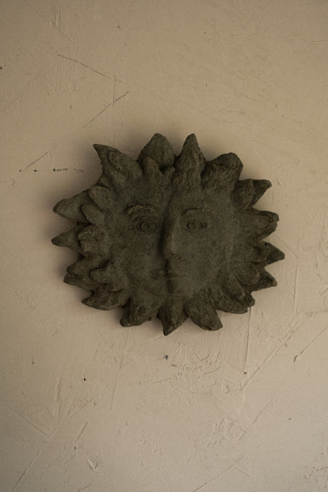 Vintage abstract stone sun face wall decor