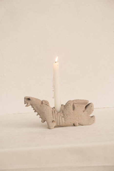 Handmade raw stone figure candle holder