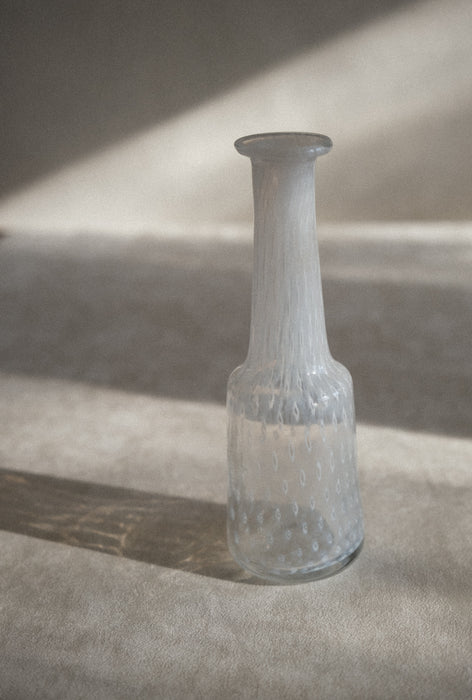 Vintage blown glass white bud vase by designer Bertil Vallien