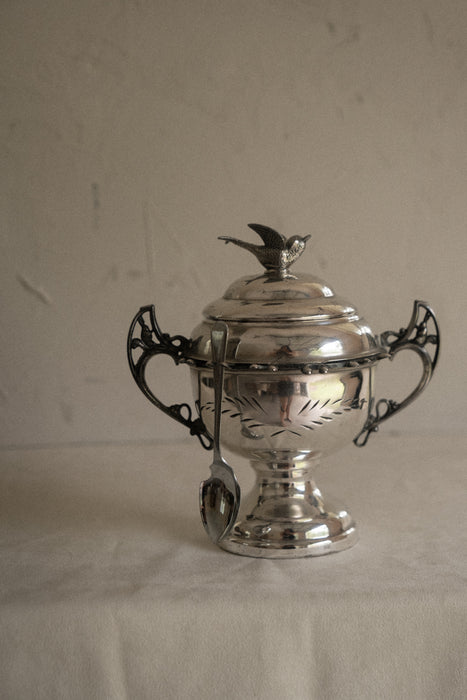 Vintage chrome sugar bowl with bird motif