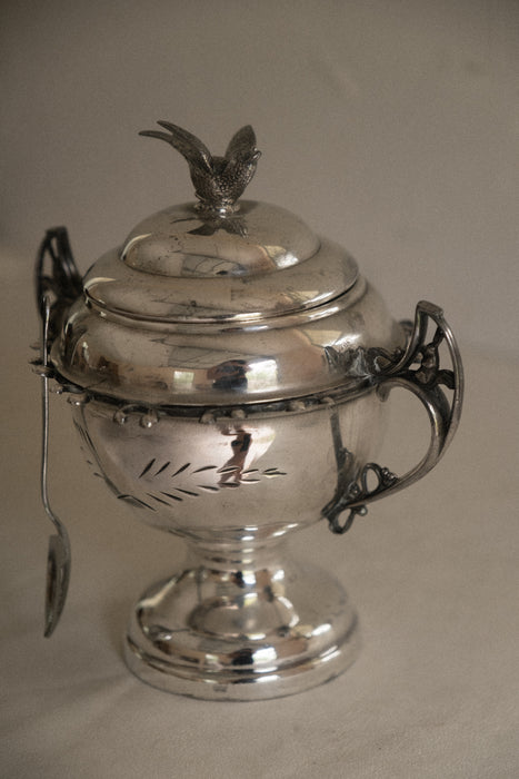 Vintage chrome sugar bowl with bird motif