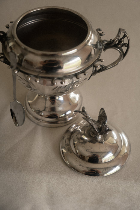 Vintage chrome sugar bowl with bird motif