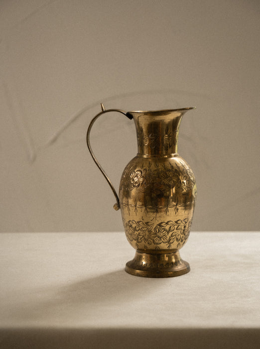 Vintage brass vase with floral design