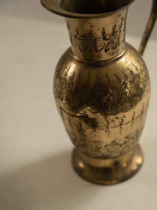 Vintage brass vase with floral design