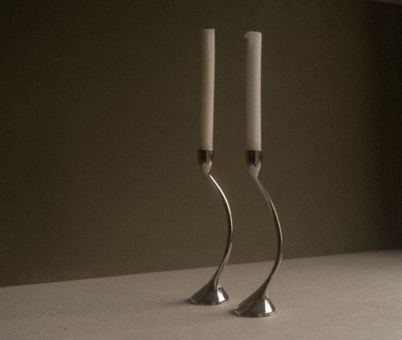 Curved chrome candlestick holders
